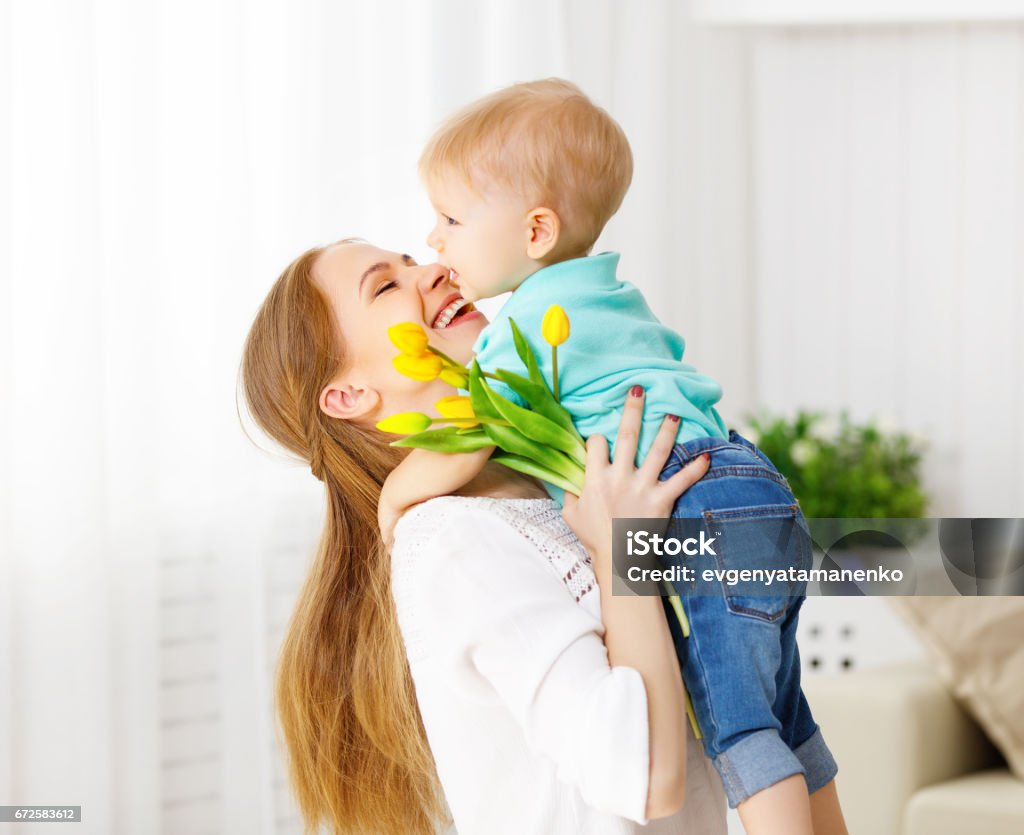 Happy Mothers Day Baby Son Gives Flowers For Mom Stock Photo ...