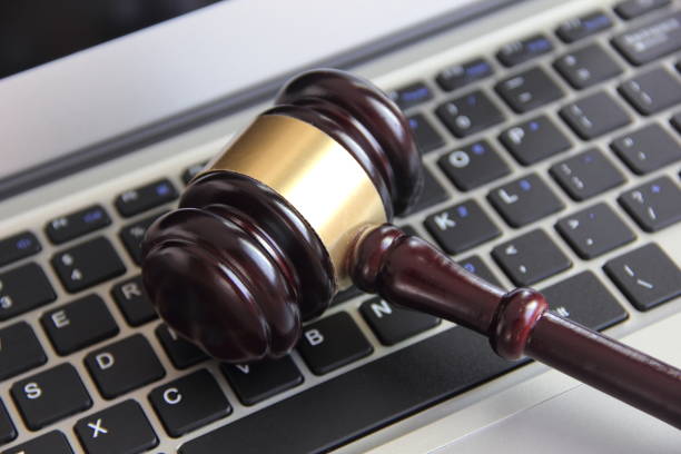 Gavel and laptop Gavel and laptop gavel keyboard stock pictures, royalty-free photos & images