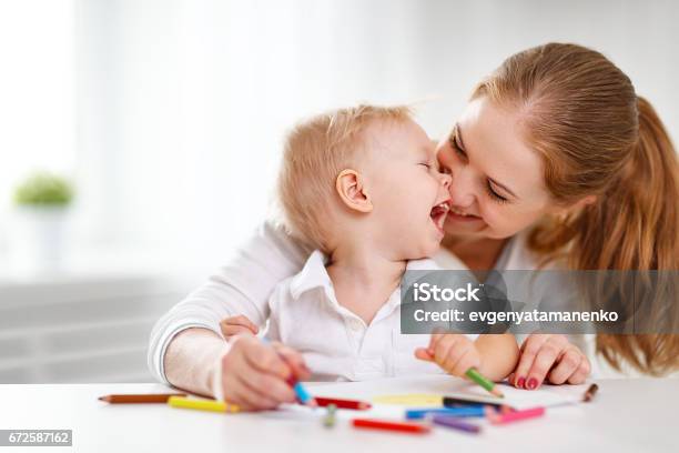 Mother With Baby Son With Colored Pencils Stock Photo - Download Image Now - Baby - Human Age, Mother, Child