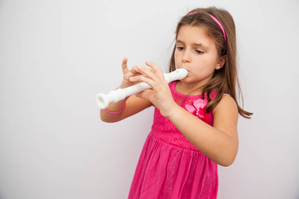 8 year old girl with musical instrument