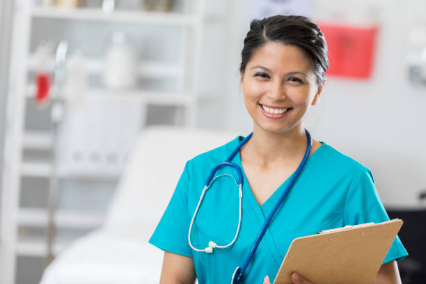istock Confident nurse in exam room 672596856