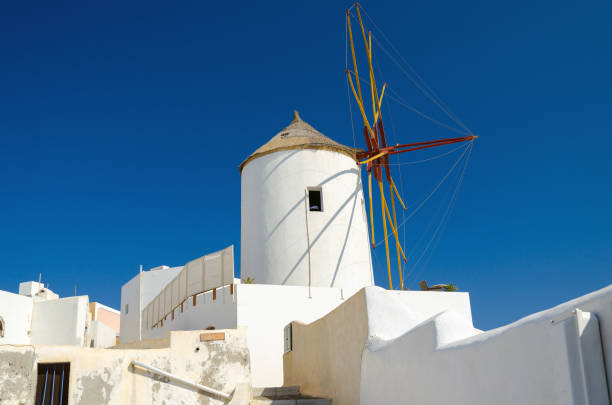 Old white windmill on Santorini island, Greece