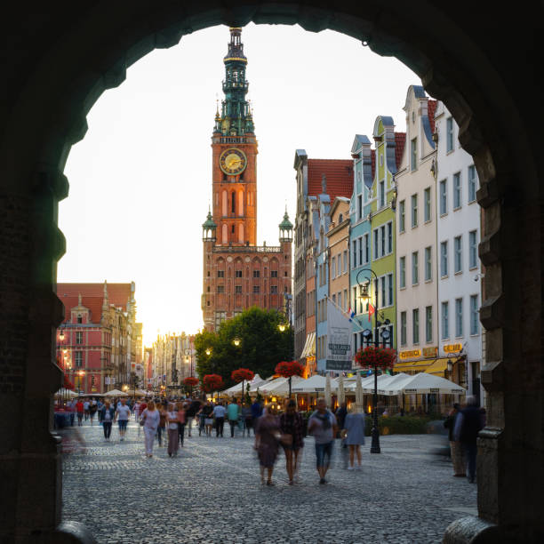 Gdansk, Poland - September 13 2016: Main Town Hall and Long Market at sunset viewed from Green Gate, Gdansk Old Town