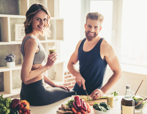 istock Couple cooking healthy food 672617746