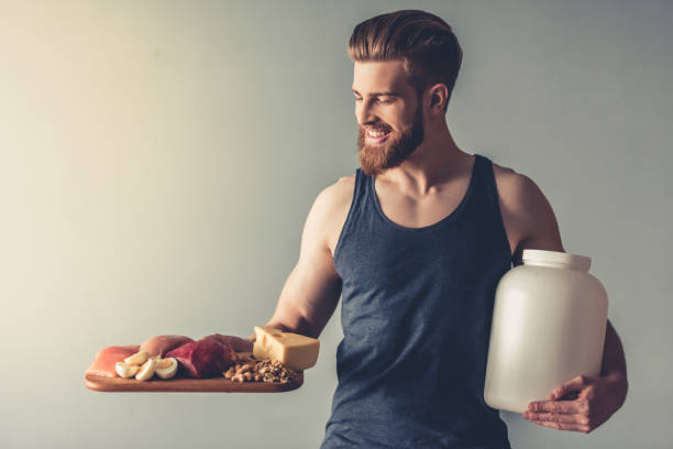 istock Man with sport nutrition 672623170