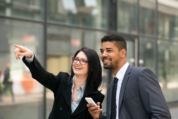 istock Businesswoman pointing direction. 672623238