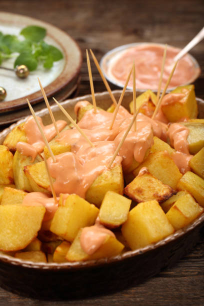 istock Patatas bravas traditional Spanish potatoes snack 672623464