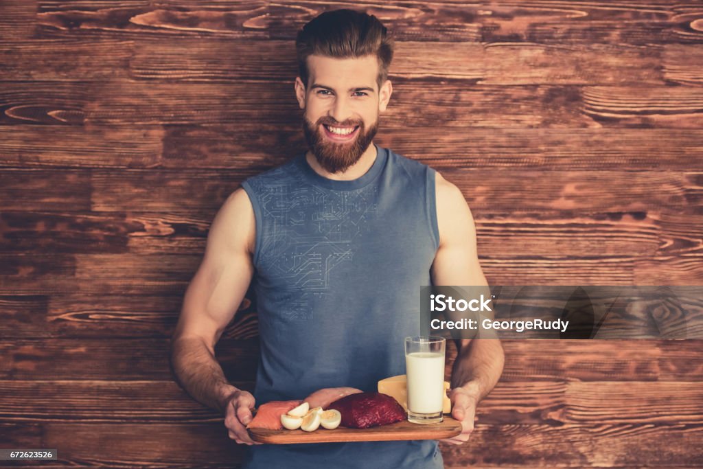 Homem com comida saudável - Foto de stock de Comer royalty-free