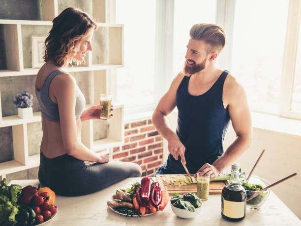 istock Couple cooking healthy food 672626694