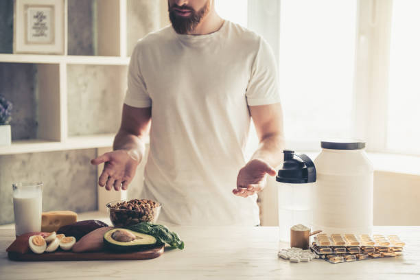 istock Man cooking healthy food 672627698