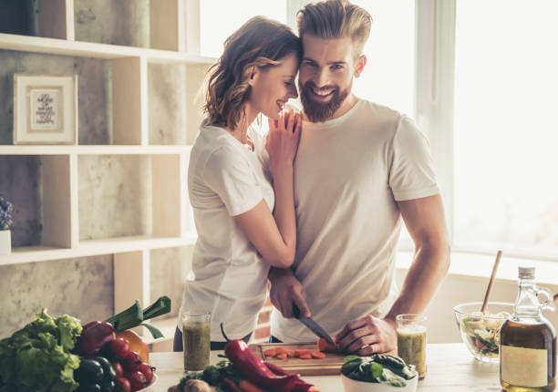 istock Couple cooking healthy food 672630666