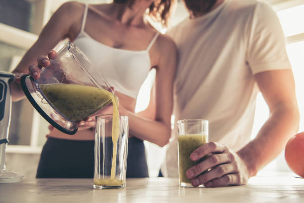 istock Couple cooking healthy food 672634656