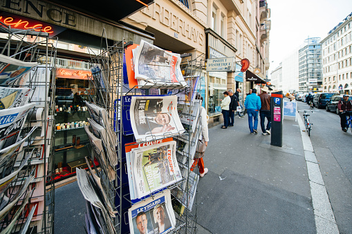 Paris: International newspapers at press kiosk wih newspaper and pictures of French Presidential election candidates, Emmanuel Macron, Marine Le Pen a day after first round of French Presidential election on April 23, 2017