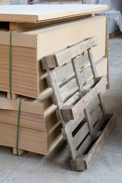 istock MDF, PARTICLE BOARD. Wood panels of different thicknesses and colors. 672650518
