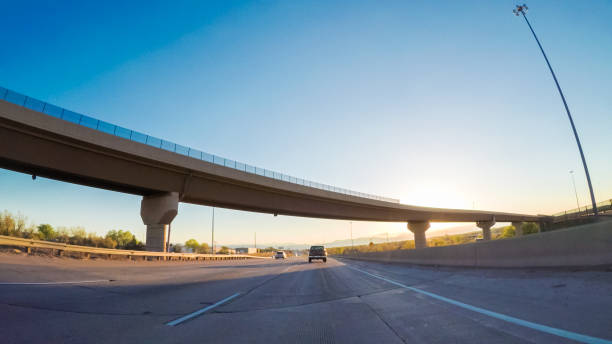 istock Driving South in Interstate highway I25 672661142