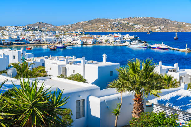 A view of Mykonos port and town, island of Mykonos, Cyclades, Greece Mykonos is Greece's most famous cosmopolitan island, a whitewashed paradise in the heart of the Cyclades mykonos photos stock pictures, royalty-free photos & images