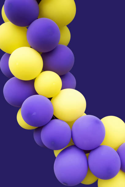 istock Purple and yellow air balloons 672678358
