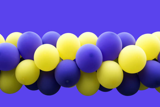 istock Purple and yellow air balloons 672680502