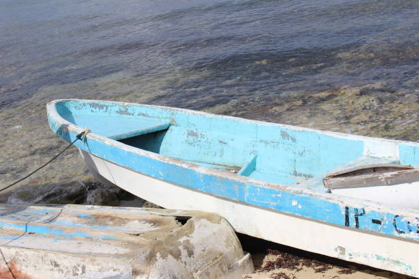istock Old boat near the ocean. 672681774