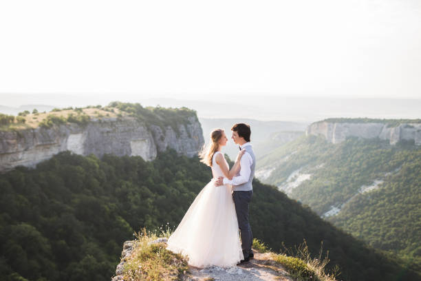 istock Wedding photo shoot in the mountains with stunning views 672689036