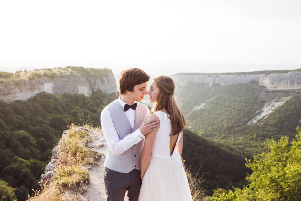 istock Wedding photo shoot in the mountains with stunning views 672689040