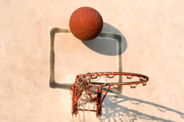 istock Old basketball hoop and ball. 672694270