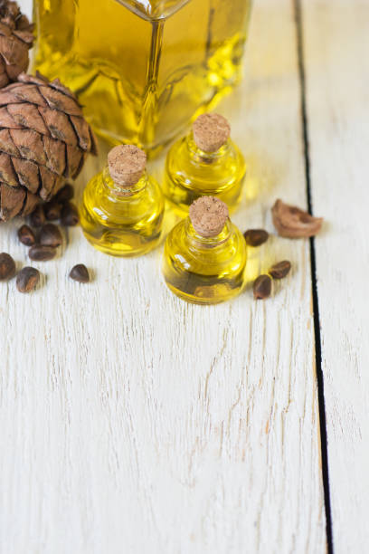 istock The cedar oil in a glass bottle 672697682