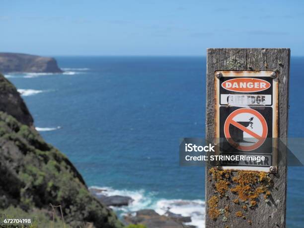 Warning Sign At Cliffs Near Cape Schanck Australia 2017 Stock Photo - Download Image Now