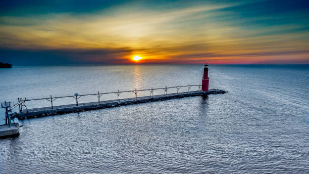 istock Greatlakes Lighthouse at Sunrise in Wisconsin 672710600