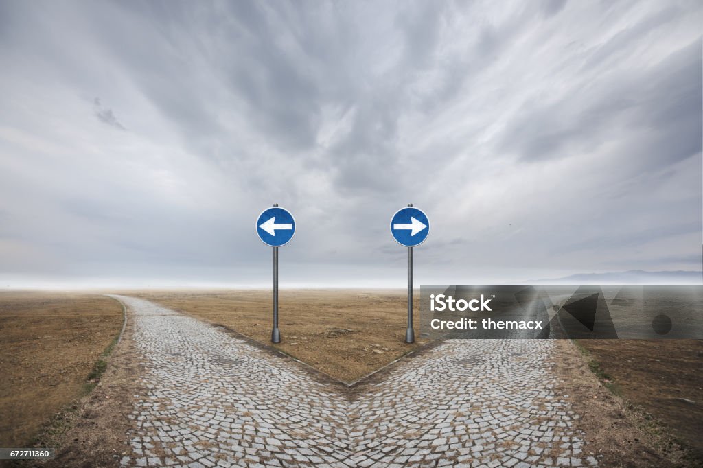 Direction Road sign direction on desert. Two Objects Stock Photo