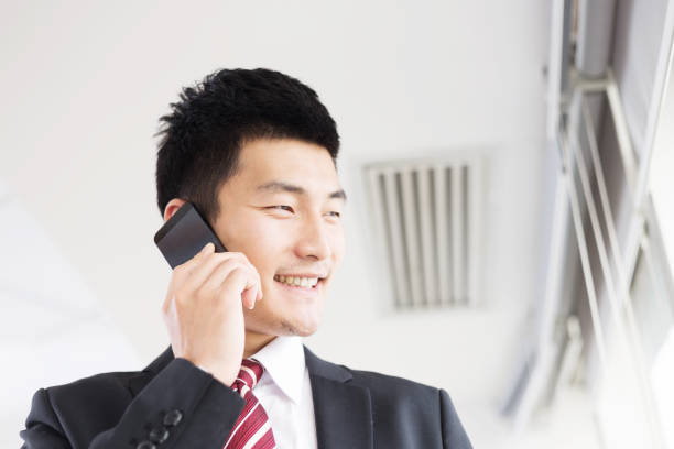 istock young asian businessman in modern office 672711824