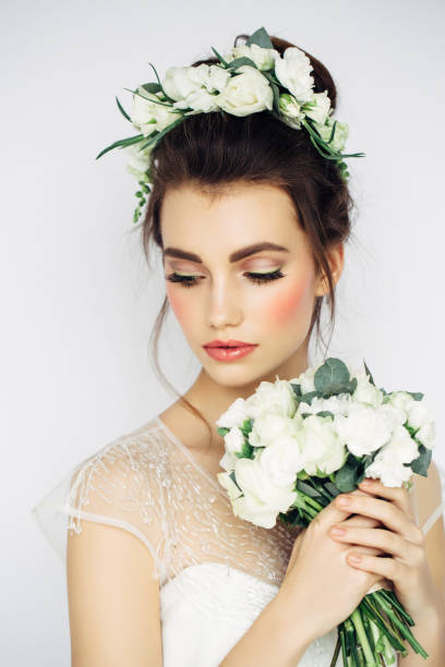 istock Studio shot of young beautiful bride 672714308