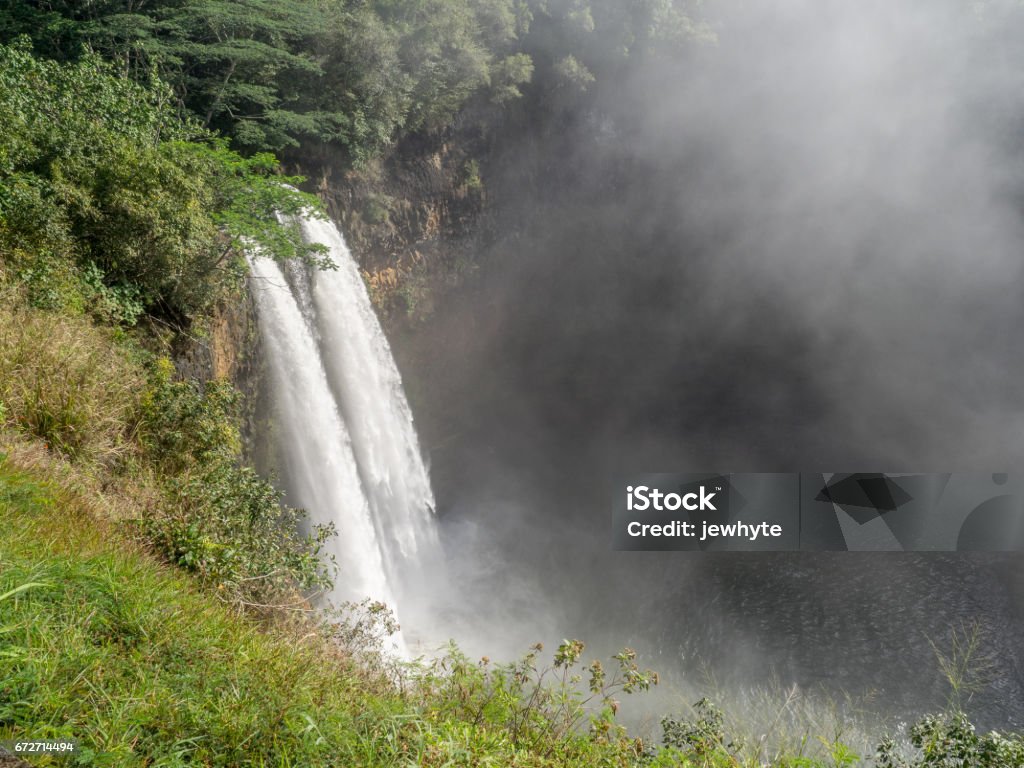 Wailua waterfalls on Kauai, Hawaii Majestic twin Wailua waterfalls on Kauai, Hawaii Green Color Stock Photo