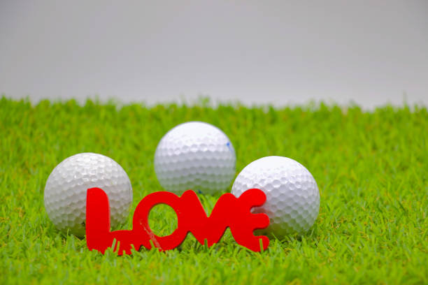 Golf with love sign on green grass golf balls with love sign golf free betting stock pictures, royalty-free photos & images