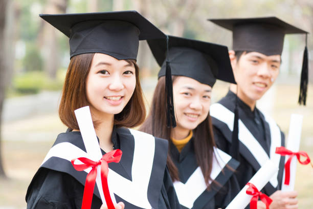 istock Group of successful students on their graduation day 672731806