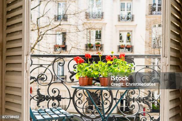 Springtime With Red Geraniums On A Paris Balcony Stock Photo - Download Image Now - Balcony, Paris - France, Flower