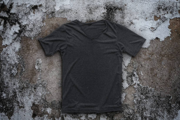 istock Grey t-shirt on concrete wall background. 672747556