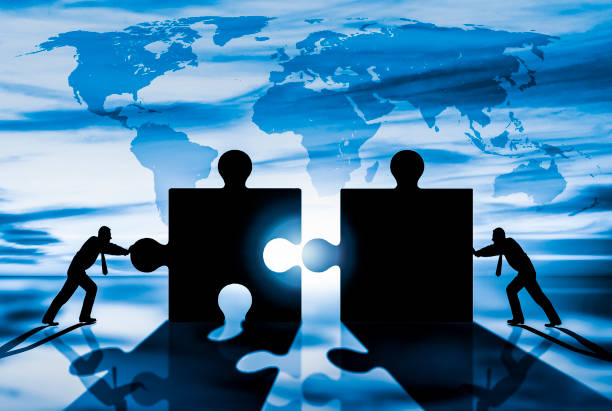istock World Business teamwork puzzle pieces 672751006