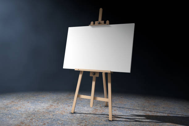 istock Wooden Artist Easel with White Mock Up Canvas in the volumetric light. 3d Rendering 672761030