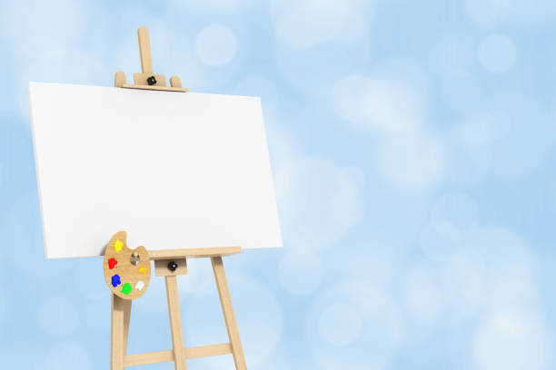 istock Wooden Artist Easel with White Mock Up Canvas and Palette. 3d Rendering 672761170
