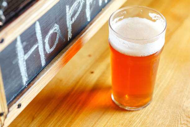 istock Pale ale on a bar counter 672762520