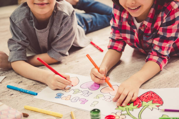 istock Children drawing at home 672762558