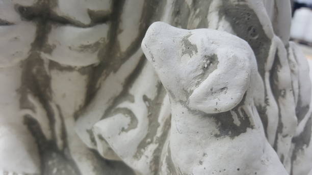 istock Stone statue of a dog 672762750