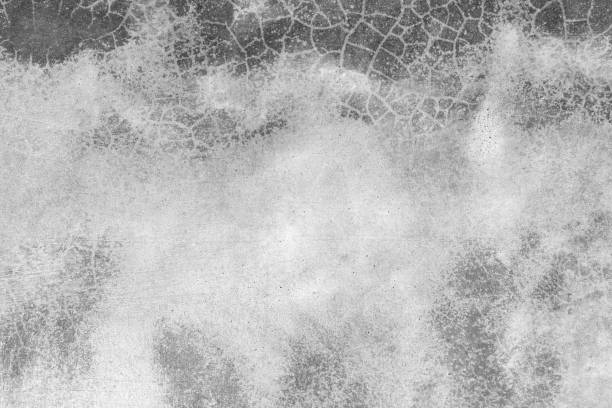 istock Grunge concrete cement wall with crack texture background 672764446