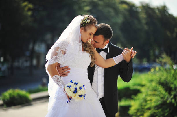 istock Groom kiss hand of bride 672772504