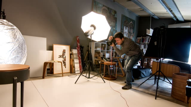 Photographer Shooting In The Studio