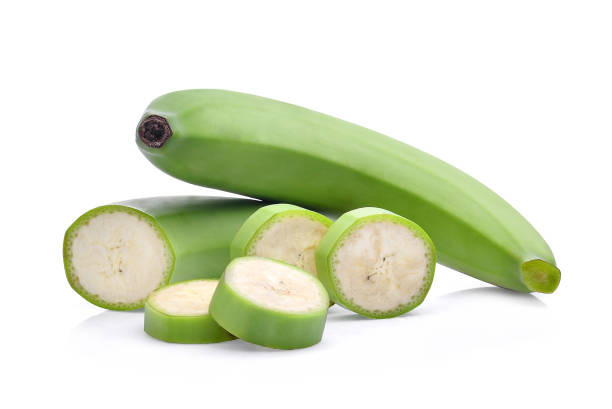 green banana isolated on white background green banana isolated on white background plantain stock pictures, royalty-free photos & images