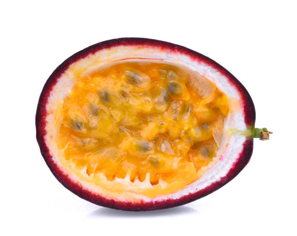 istock half of passion fruit isolated on white background 672788756