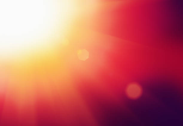 istock Blazing hot sun with dazzling red and orange rays 672792332