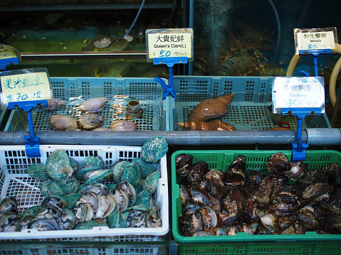 Fish for sale at a fishmonger's in Walthamstow High Street, London. December 2023